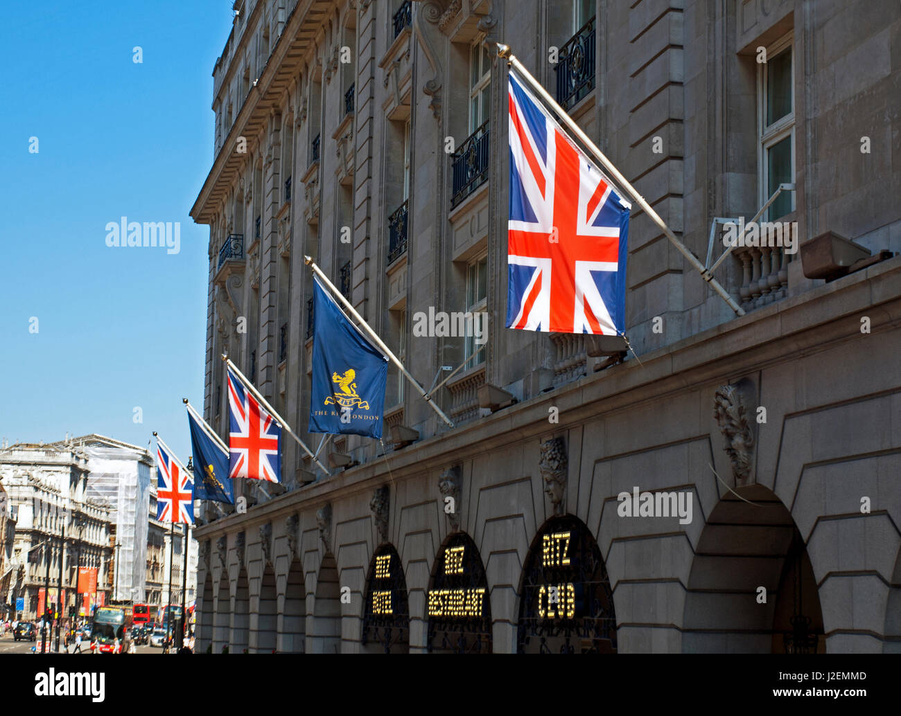 Europe, United Kingdom, England, Central London, City of Westminster, West End. Exterior of The Ritz London Hotel on Piccadilly showing the Royal Academy of Arts (Burlington House) in distance. Stock Photo