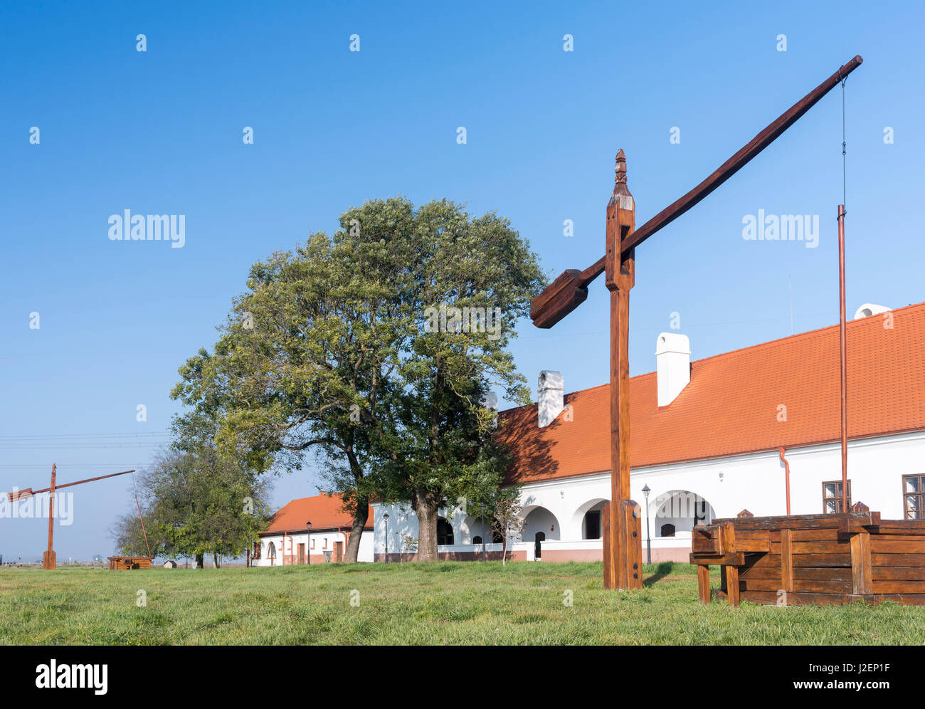 Traditional water well (well sweep or shadoof) in the Hungarian lowland plains also called Puszta in the Hotobagy National Park, which is listed as UNESCO world heritage Hungary, November (Large format sizes available) Stock Photo