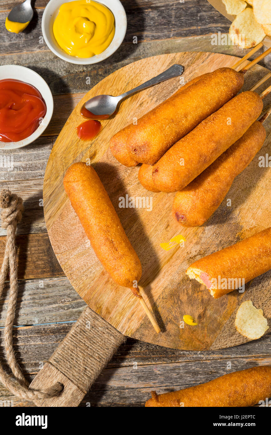 Homemade Deep Fried Corn Dogs with Mustard and Ketchup Stock Photo Alamy