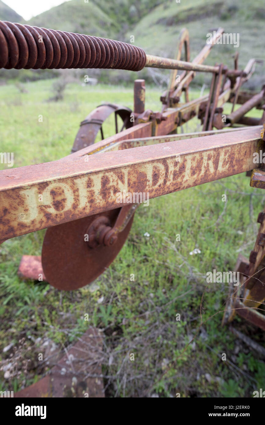 Old John Deere farm implement in Eastern Washington. Stock Photo