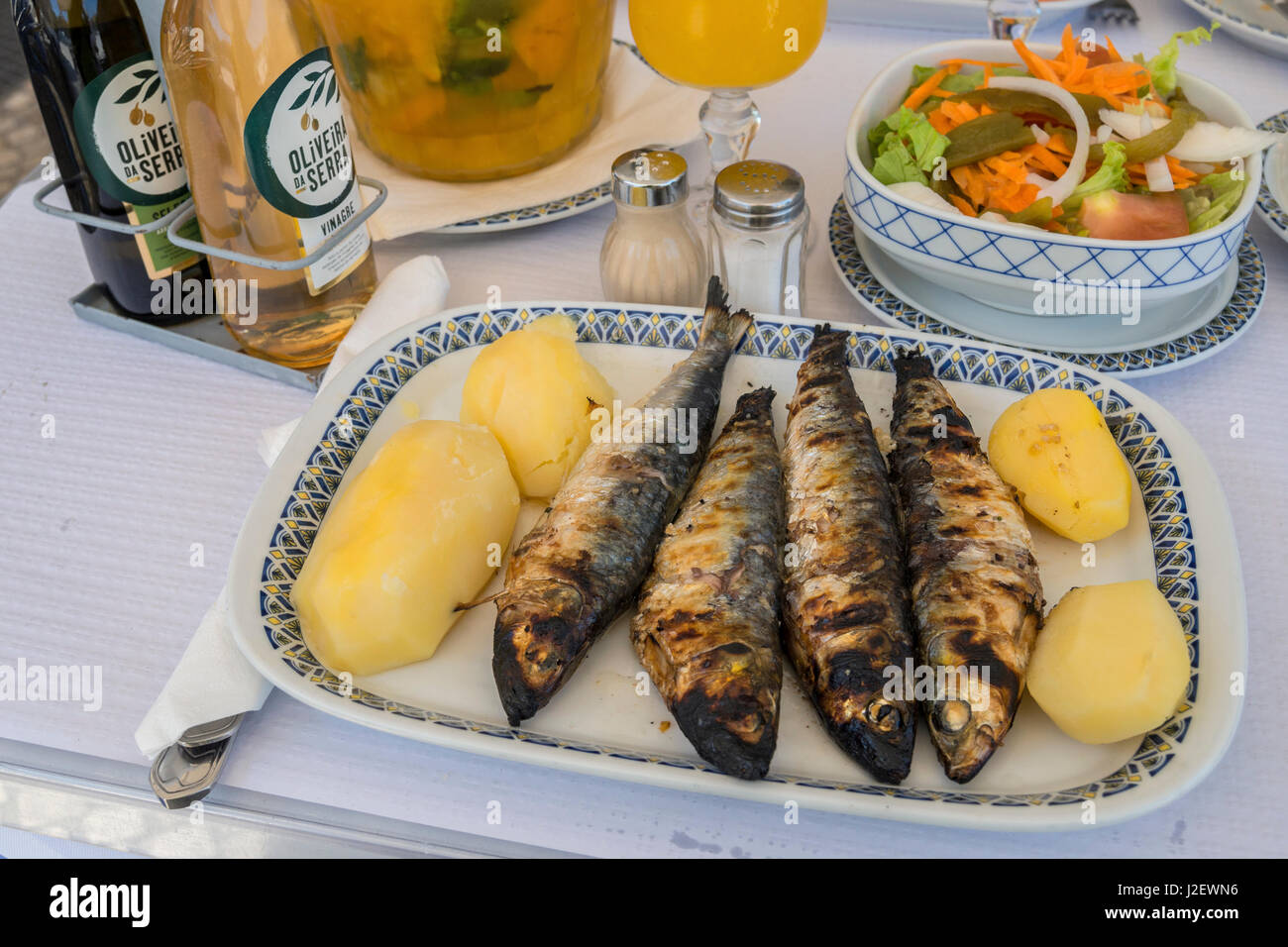 Portugal, Lisbon, grilled sardines and potatoes, Portuguese food Stock Photo Alamy