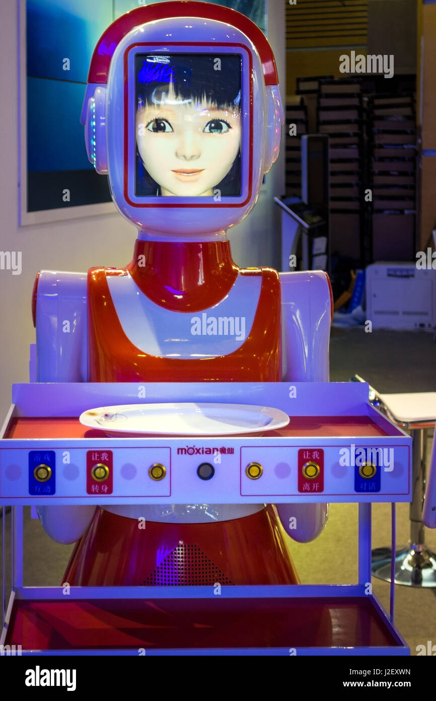 Robot female, human form, with buttons in Chinese to choose services Stock Photo