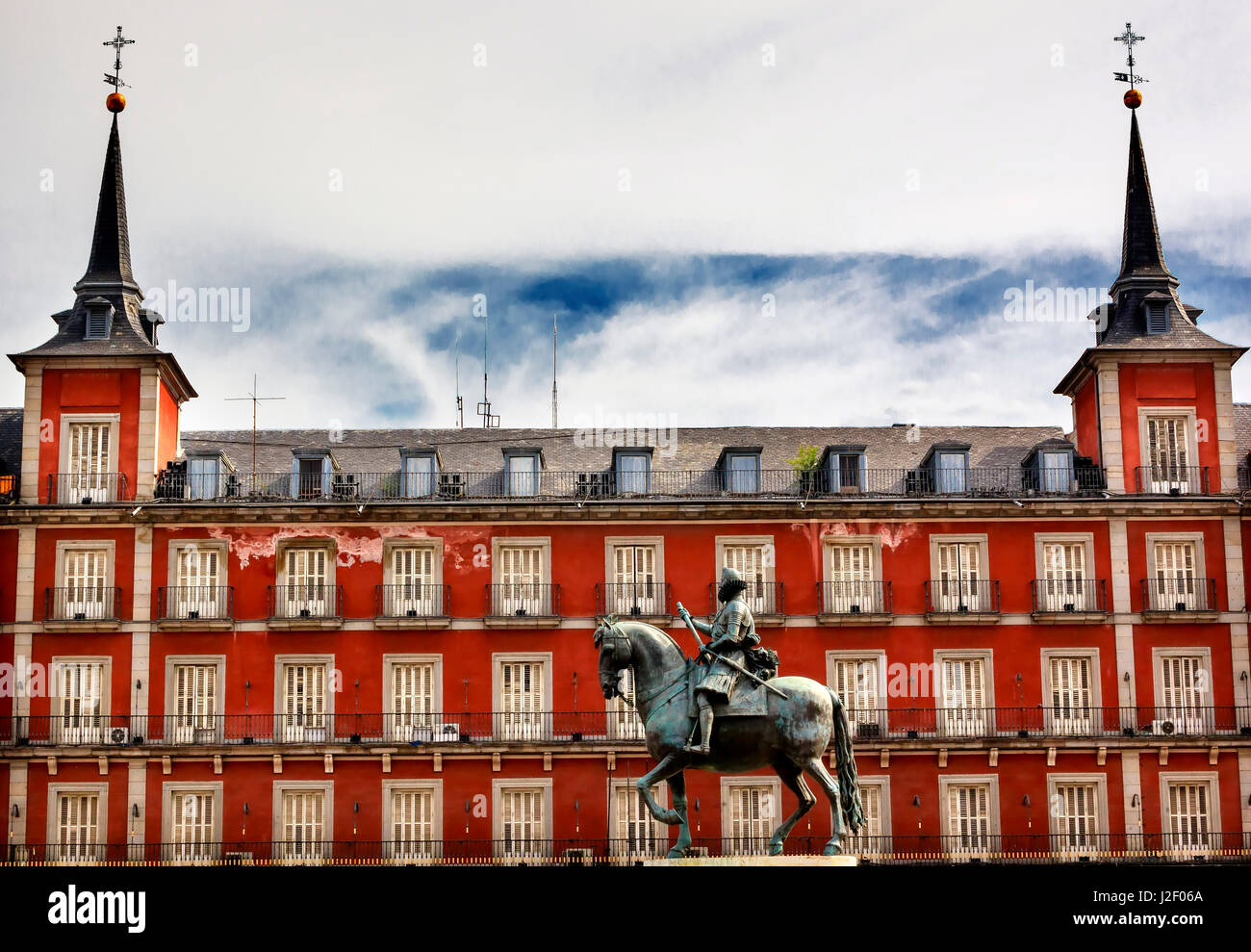 Plaza Mayor, built in the 1617, Madrid, Spain. King Philip III Equestrian Statue created in 1616 by Sculptors Gambologna and Pietro Tacca Stock Photo