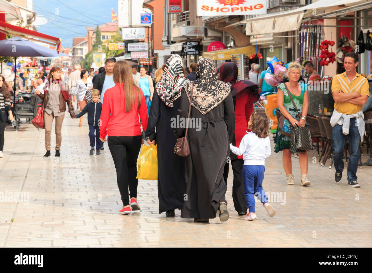Macedonia, Lake Ohrid, Struga situated in the Southwest region. The town of Struga is the seat of Struga Municipality. Shoppers along pedestrian street. (Editorial Use Only) Stock Photo