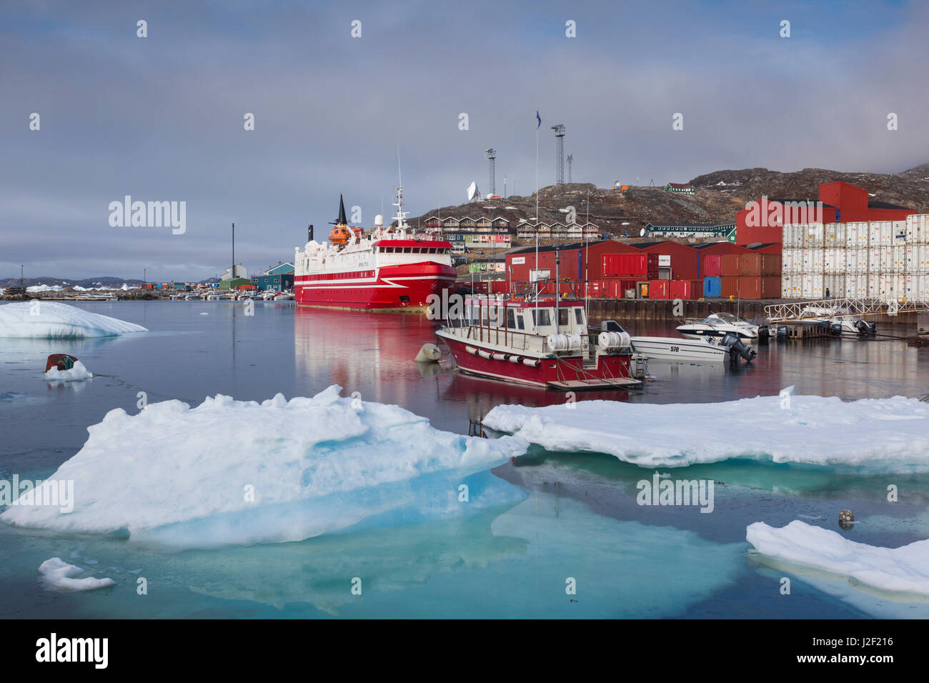 Greenland, Qaqortoq, elevated view of coastal ferry, dawn Stock Photo
