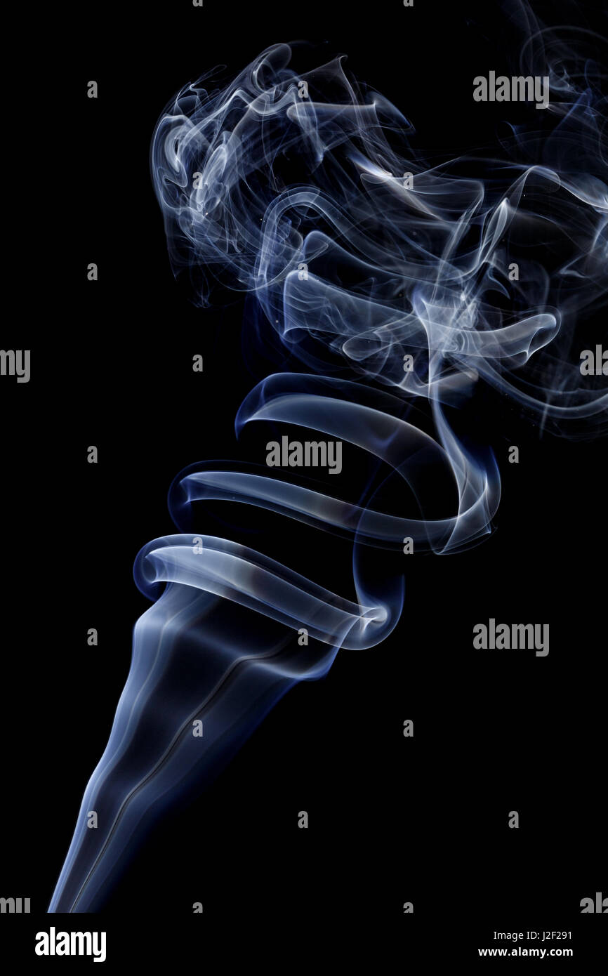 Abstract art. Color white blue smoke from the aromatic sticks on a