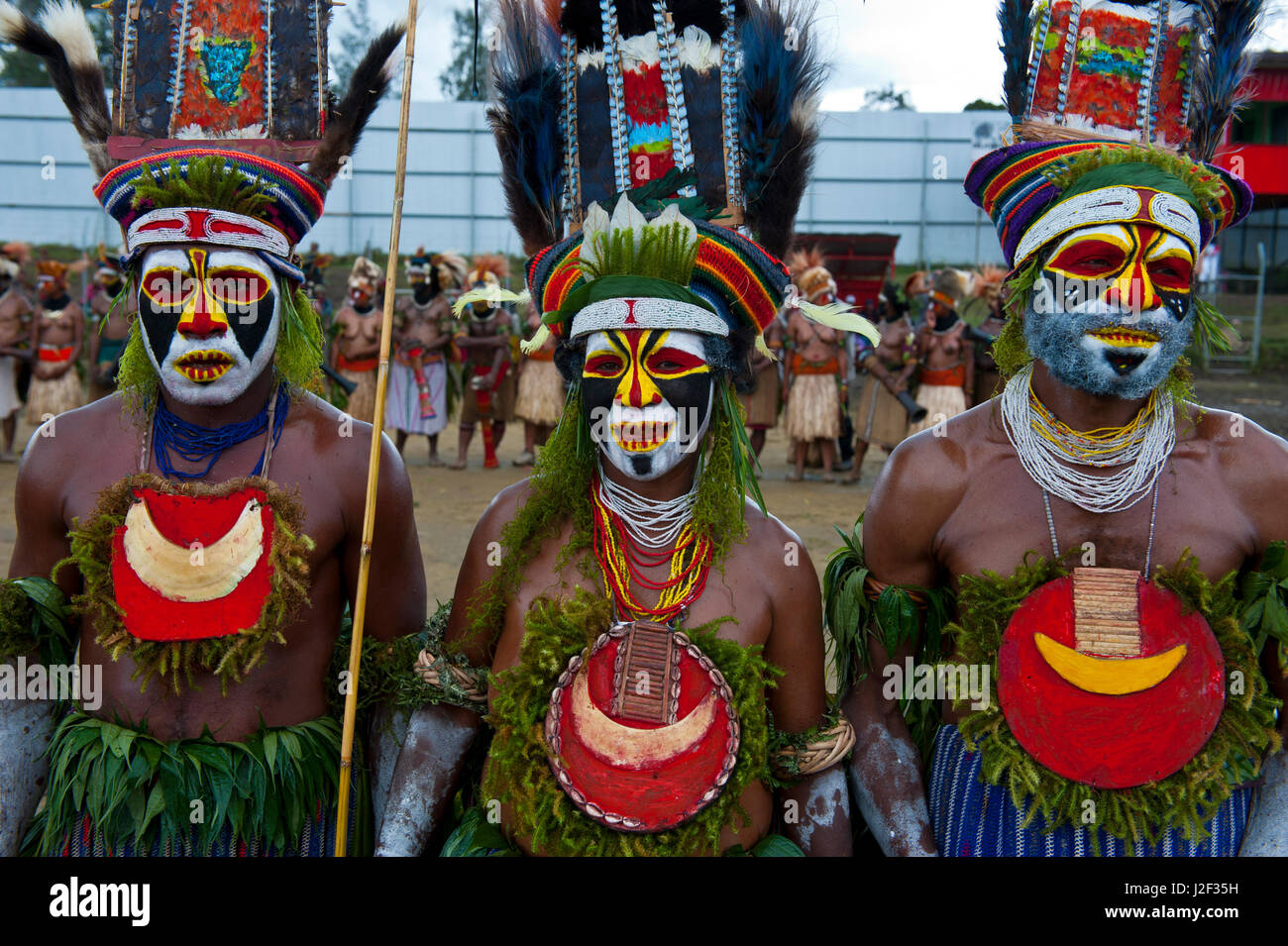 Colorful dress and face painted local tribes celebrating the traditional Sing Sing in Enga in the Highlands of Papua New Guinea, Melanesia Stock Photo