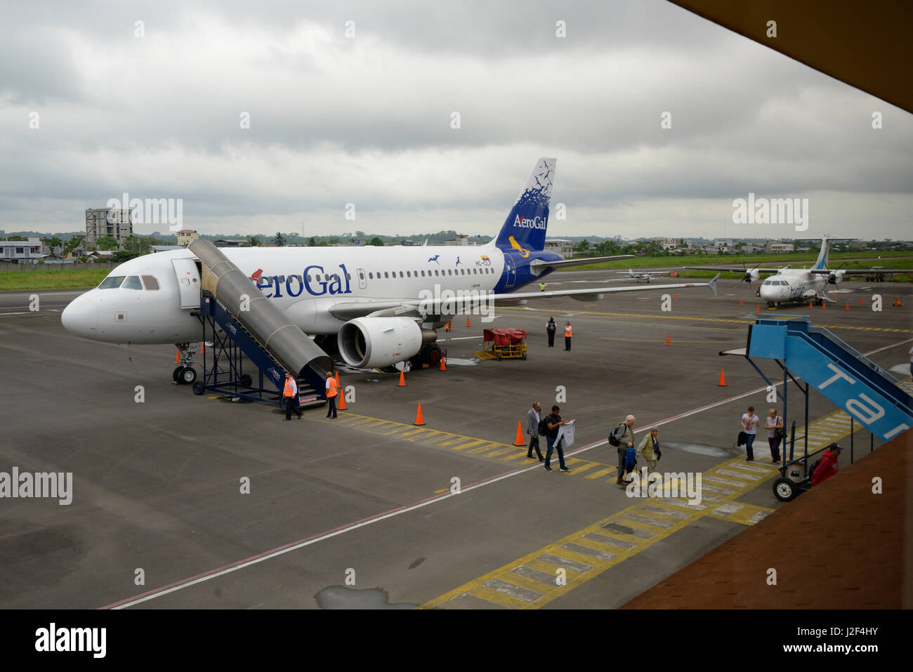 Ecuador, Orellana, San Francisco de Orellana, Coca. AeroGal Airbus A319 passengers disembarking at Coca Airport (Large format sizes available) Stock Photo