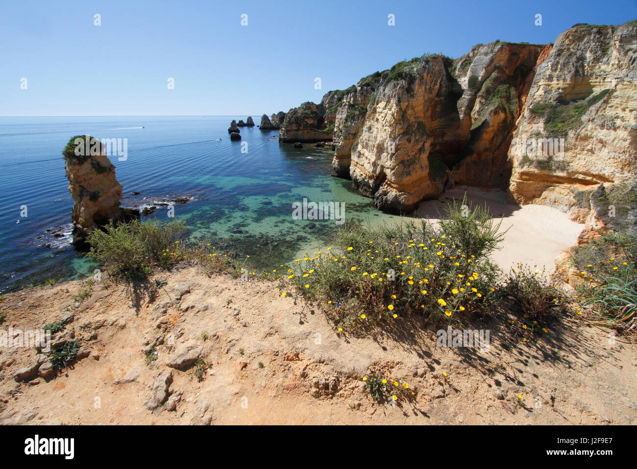 Rocky coast of the atlantic ocean at Lagos in the Algarve in Portugal Stock Photo