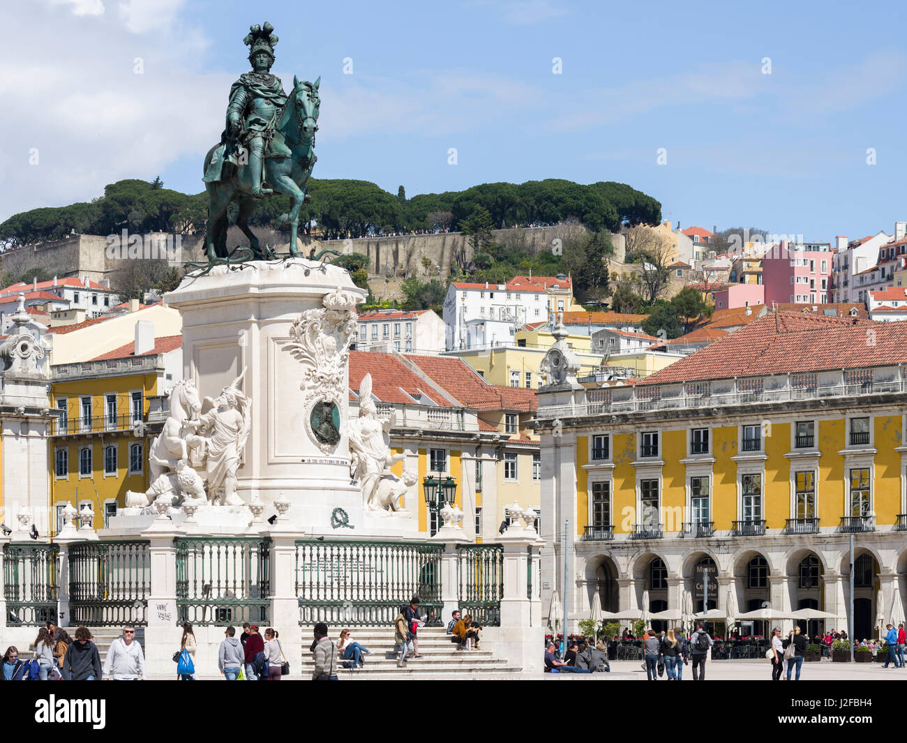 The statue of Dom Jose I at the square Praca do Comerico. Castelo de Sao Jorge in the background. Lisbon (Lisboa) the capital of Portugal. Stock Photo