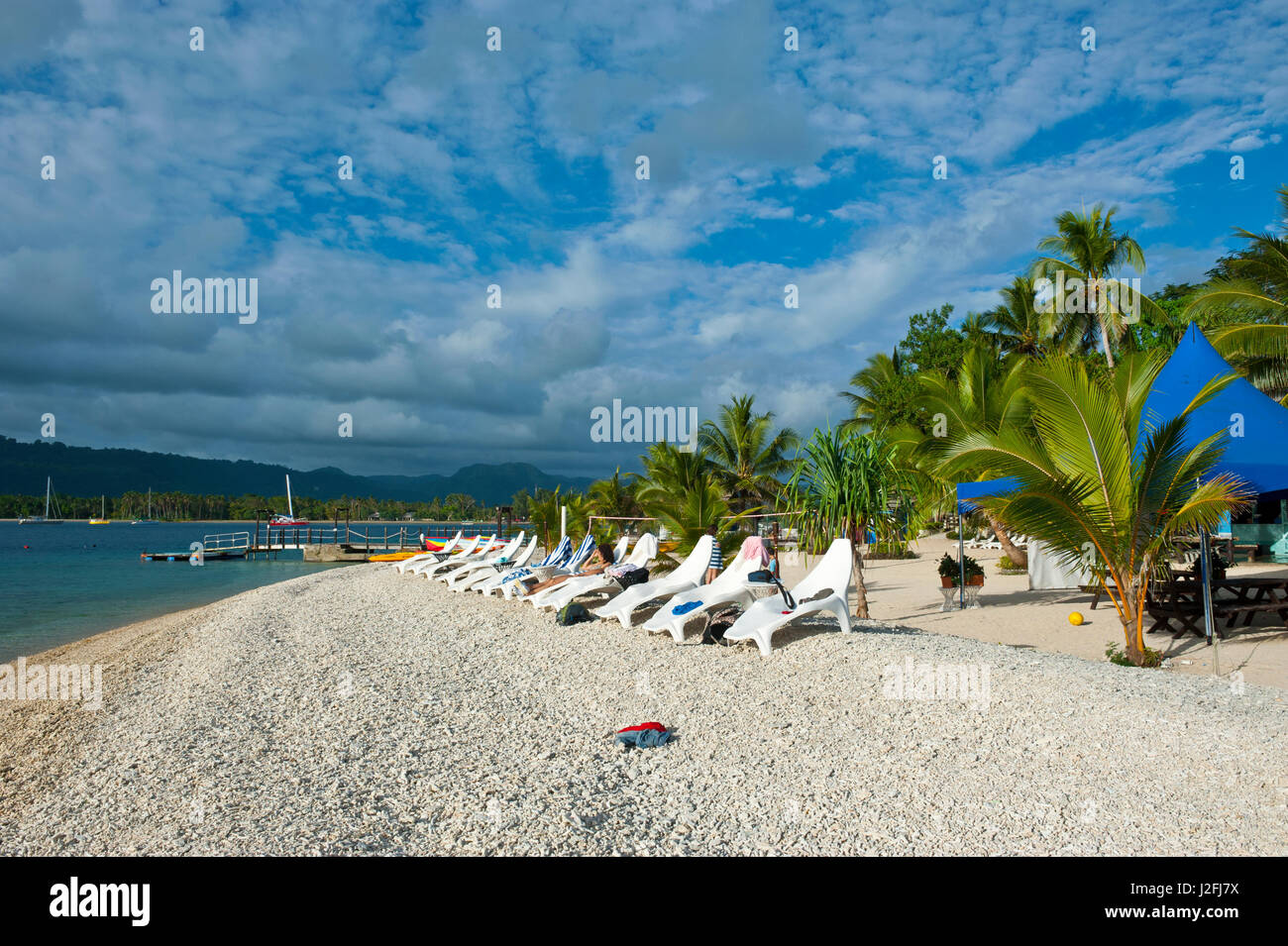 Beach chairs lining up at Hideaway Island near Port Vila, Efate Island, Vanuatu, South Pacific Stock Photo