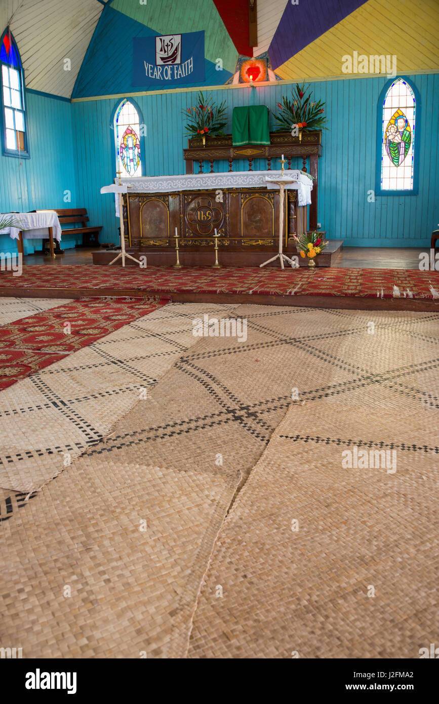 Fiji, Island of Ovalua, town of Levuka. First Colonial settlement and capital of Fiji in 1874. UNESCO World Heritage Site. Sacred Heart Parish Church. Church interior tropical woven palm mats on the floor. (Large format sizes available) Stock Photo