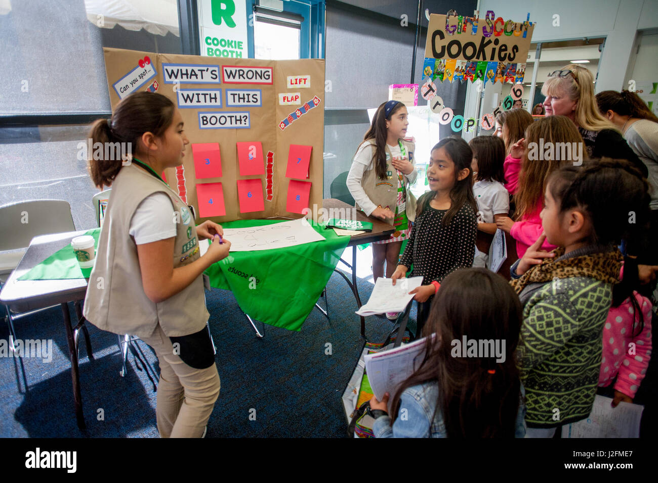 Girl's scout cookie hires stock photography and images Alamy