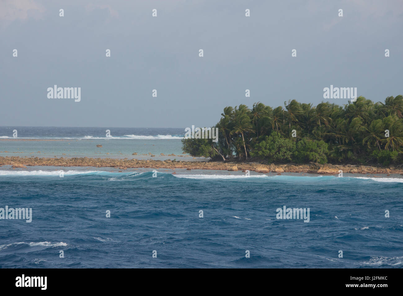 Federated States of Micronesia, Caroline Islands, Yap, Island of Ifalik. Pacific view of tiny reef island of Ifalik. (Large format sizes available) Stock Photo