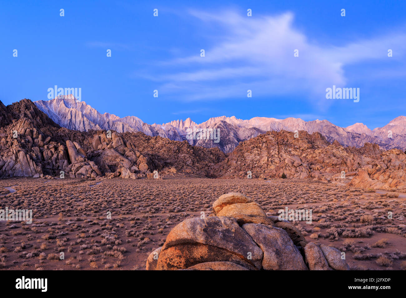 A long exposure image of Mount Whitney and Lone Pine Peak above the Alabama Hills region outside of Lone Pine, California. Stock Photo