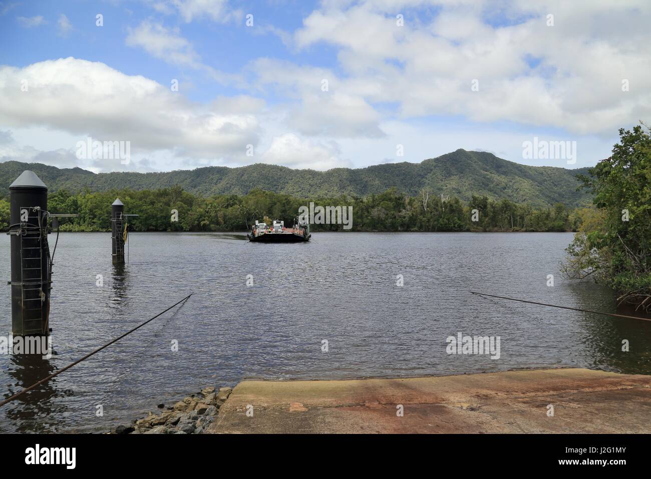 The Daintree River Ferry, a cable ferry, is the only way to access Cape Tribulation in northern Queensland, Australia Stock Photo