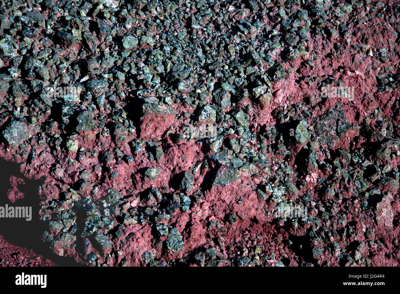 A tight close-up of the mineral rich rocks found in the Domeyko Mountains of the Chile. Stock Photo