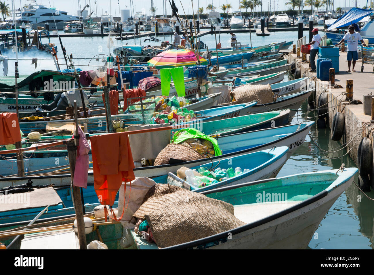 La Cruz de Huanacaxtle fishing village with colorful fishing boats in the harbor, showing the authentic charm of this traditional Mexican coastal community