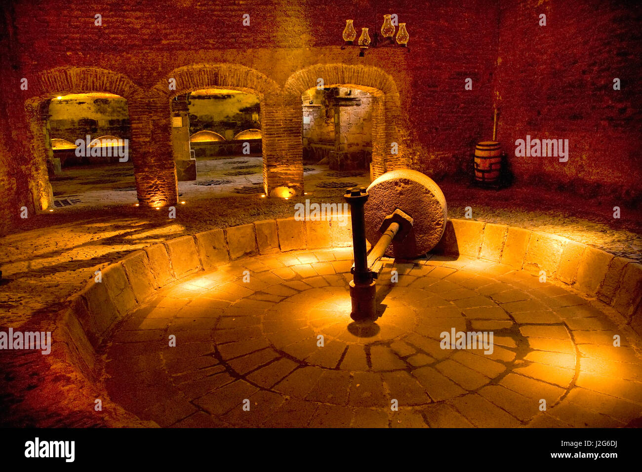 Old Tequila factory. Grinding wheel, Agave ovens, Guadalajara, Mexico