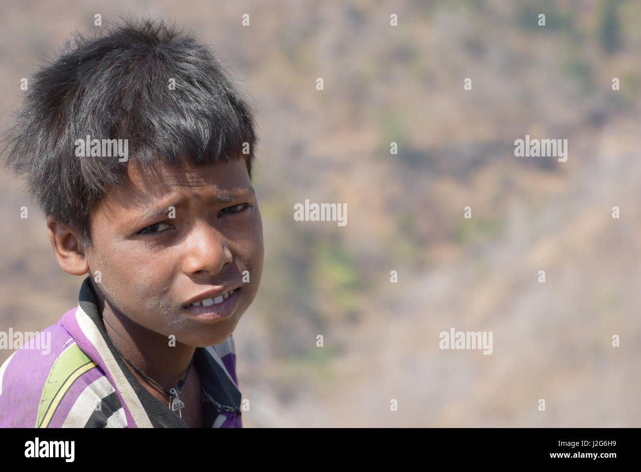 kid posing for pic after working in a garden Stock Photo