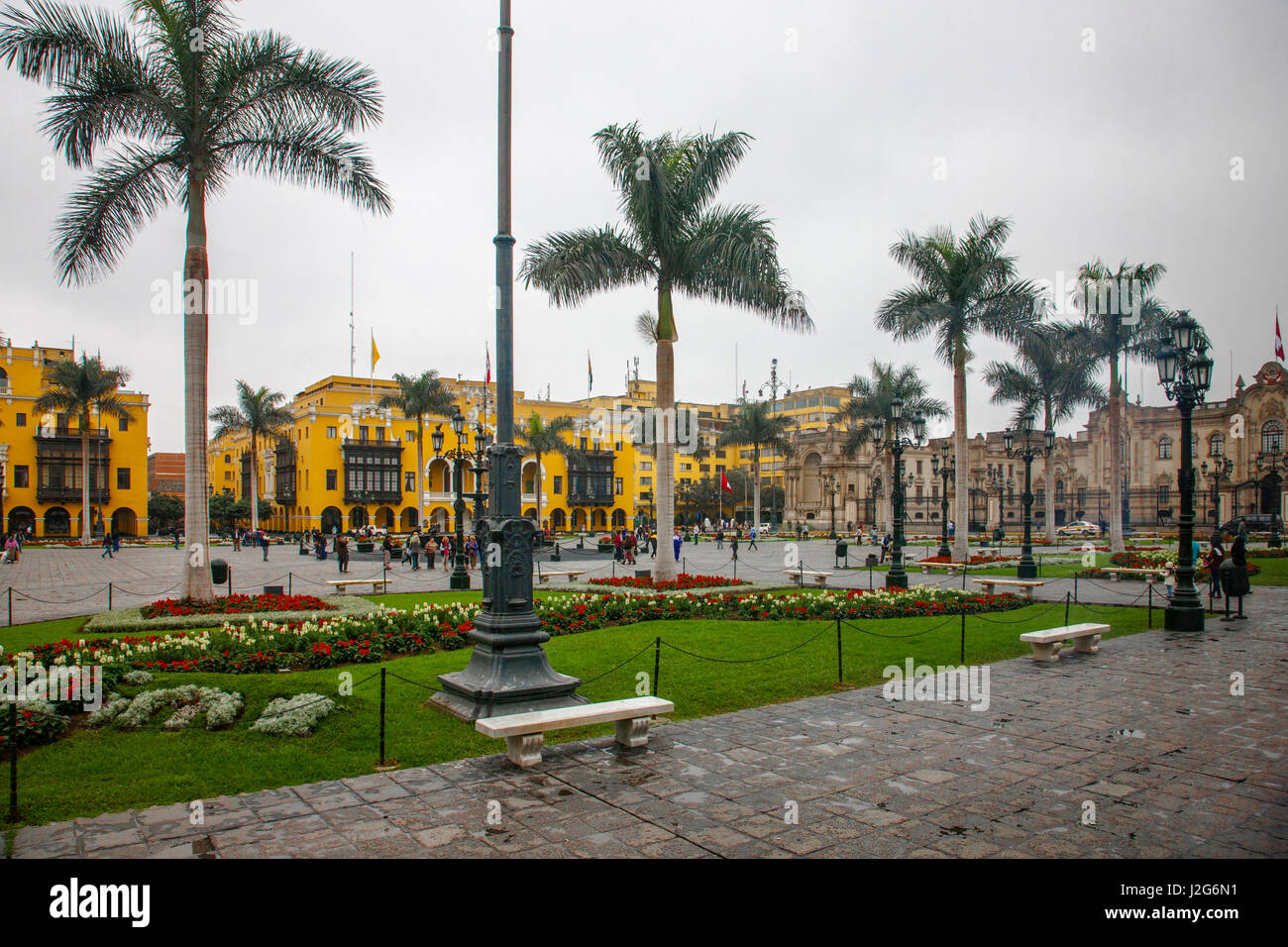 The Plaza Mayor, or Plaza de Armas of Lima is the birthplace of the city. Following the mandate of Charles First of Spain, Francisco Pizarro designated this location to build the plaza. Stock Photo