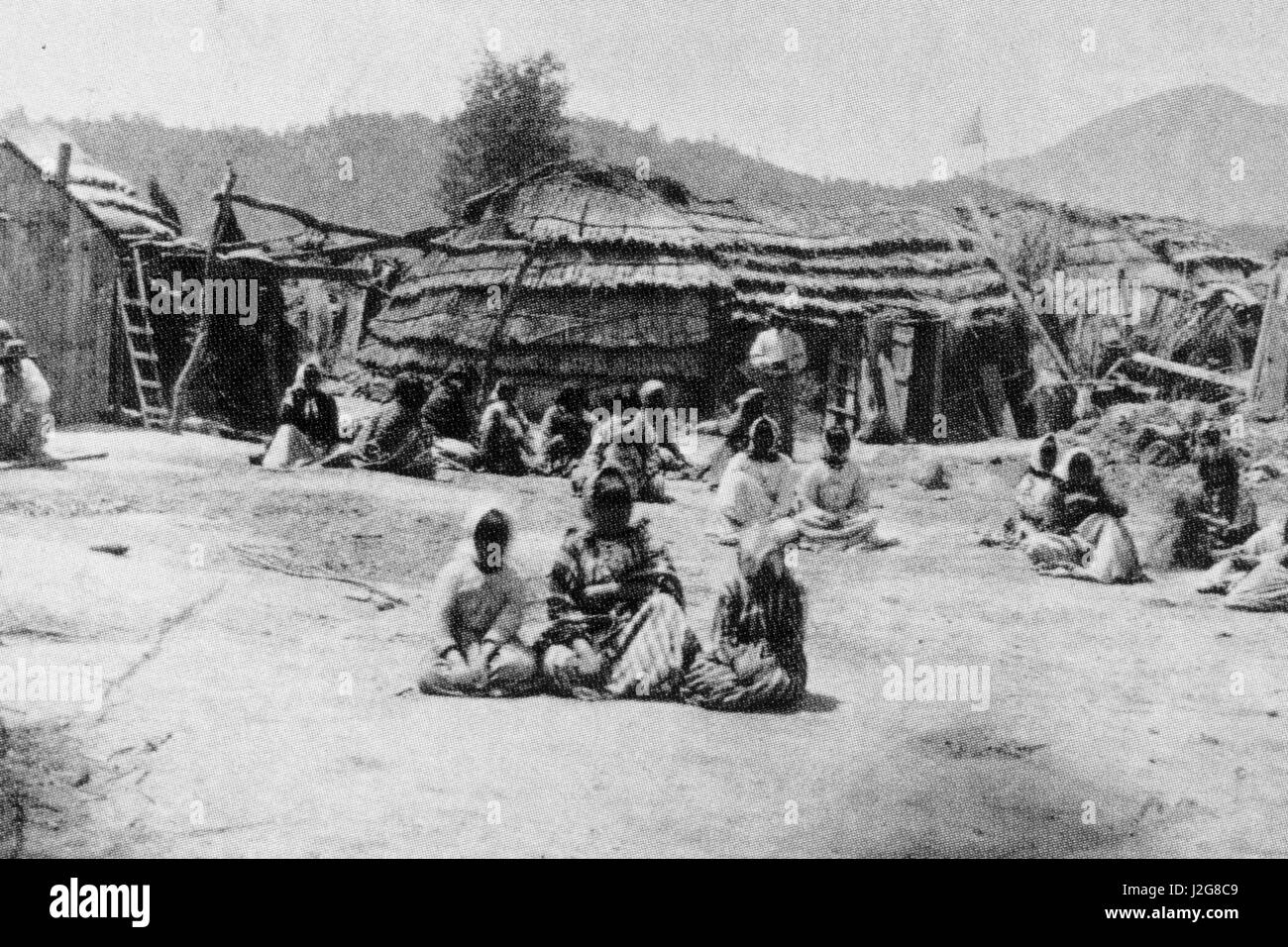 1875 black and white historic photograph of a traditional Pomo Indian Village, California
