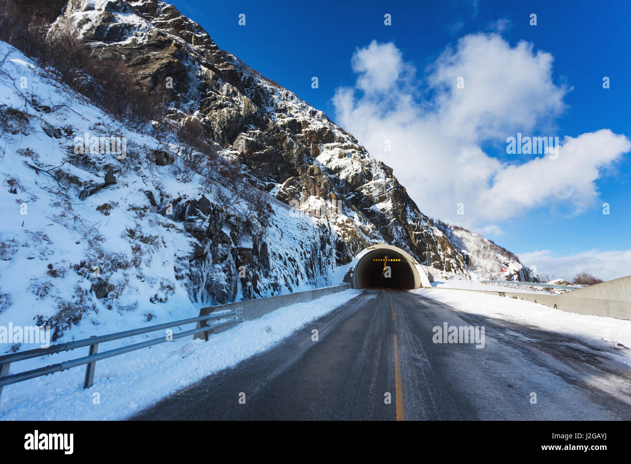 The tunnel through the mountain in the Lofoten Islands Stock Photo Alamy