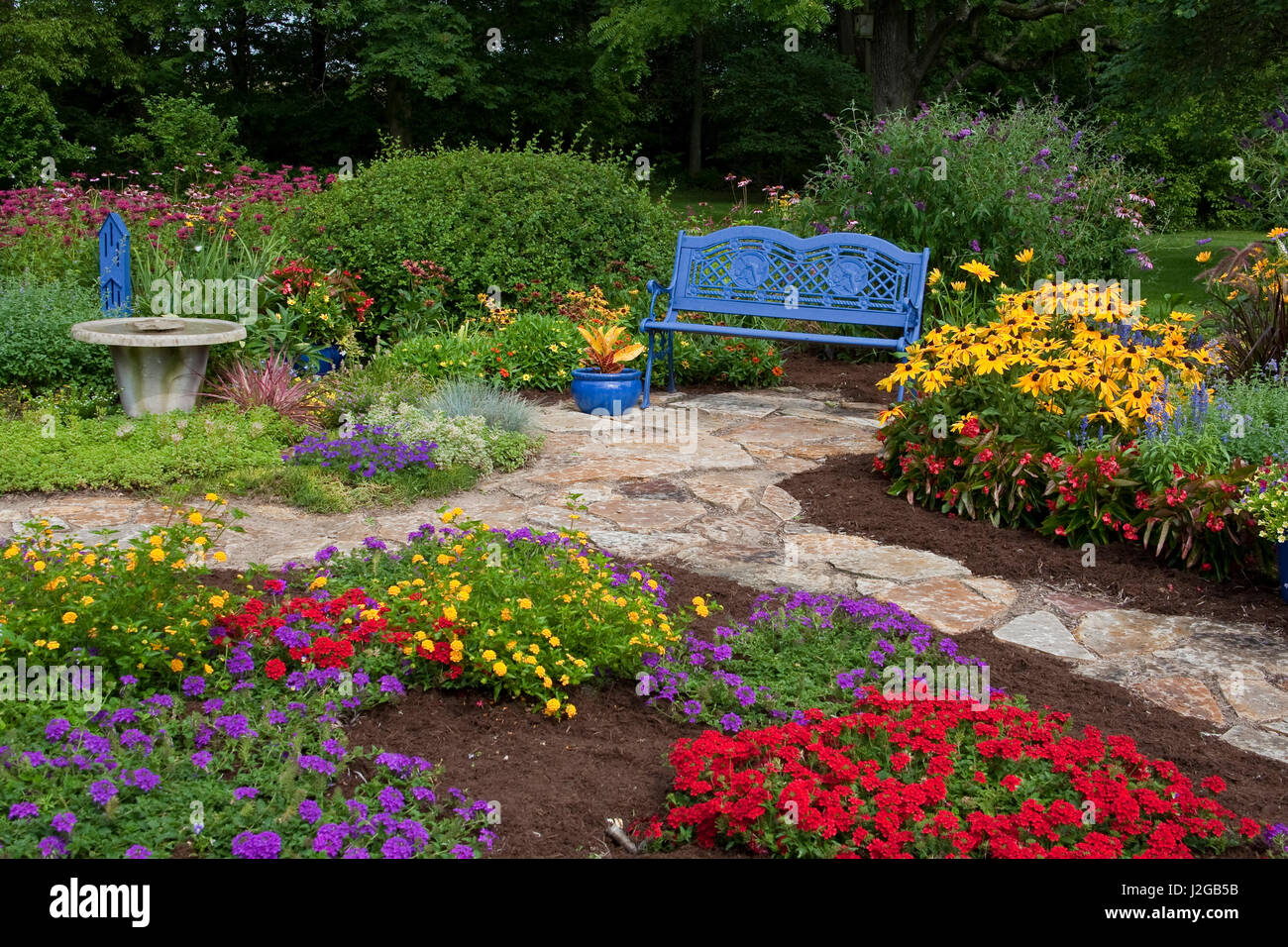 Beautiful backyard garden and bench, Marion County, Illinois Stock Photo
