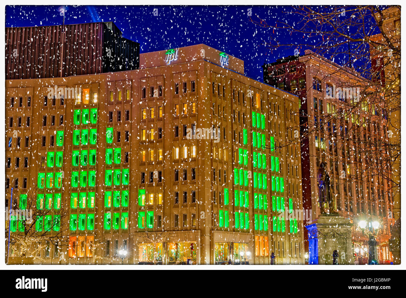 USA, Indianapolis, Indiana. View of downtown buildings and lights during Christmas holiday