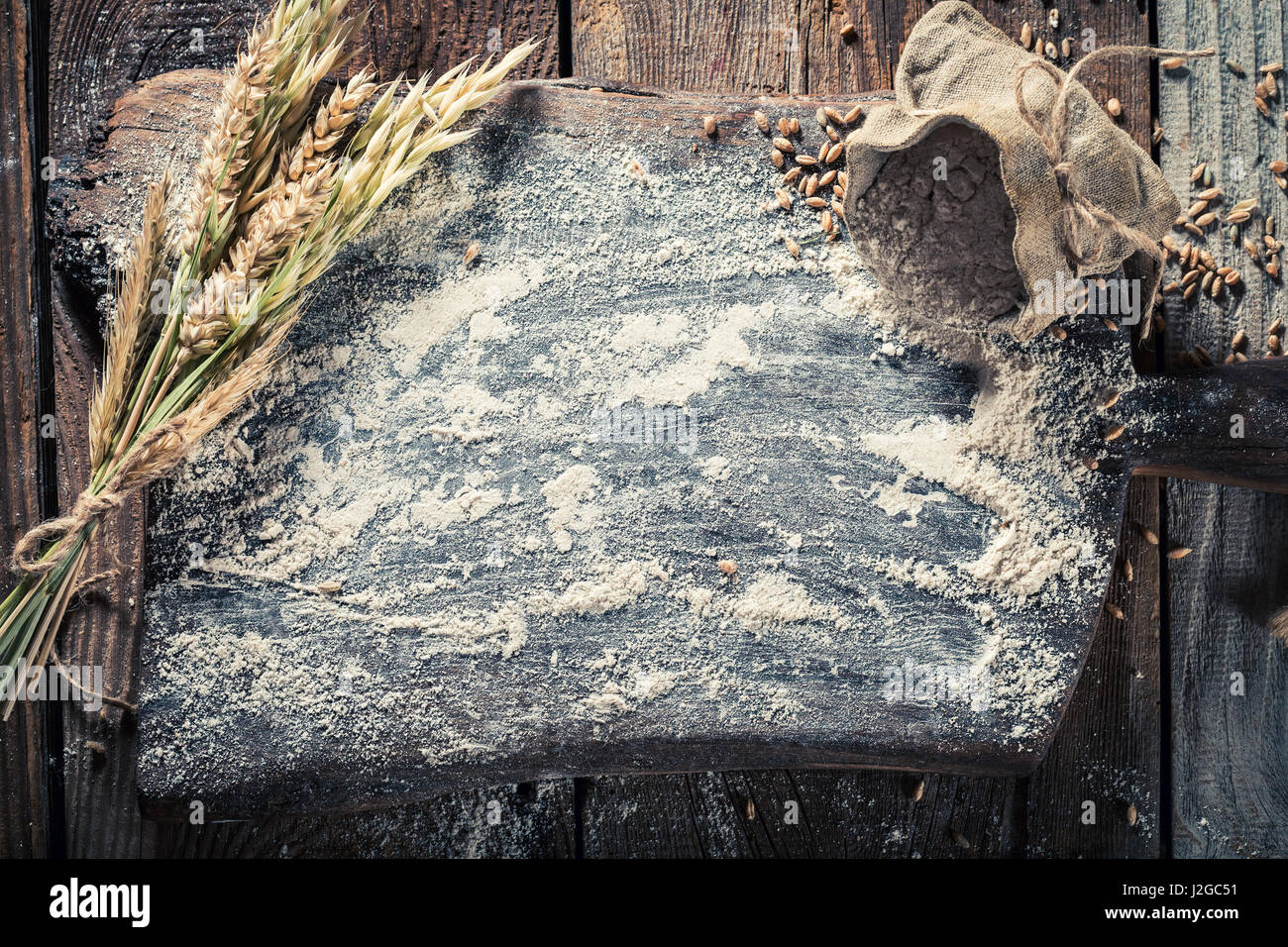 Homemade ingredients for bread with whole grains as frame stock photo