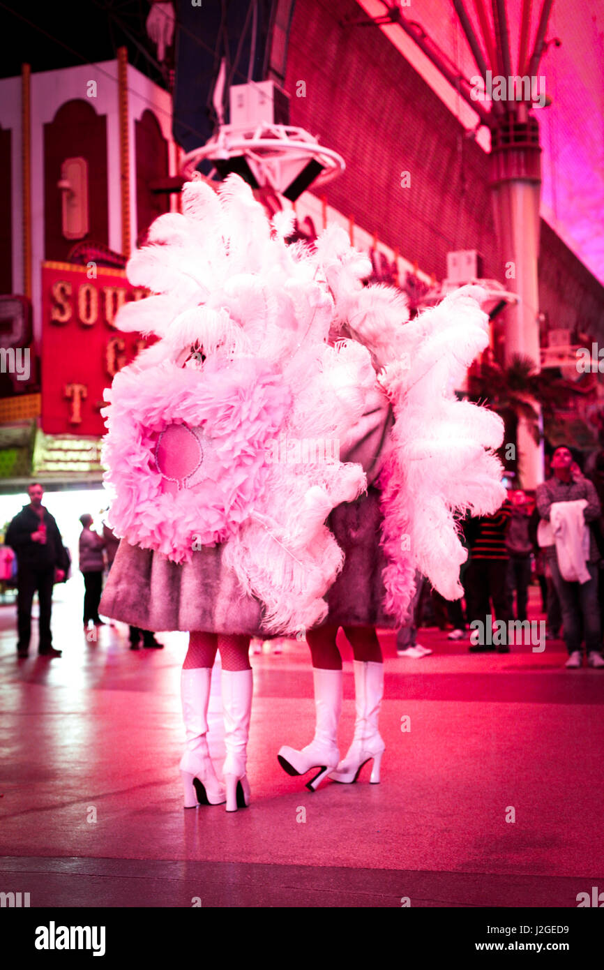 Performers covered in feathers on Fremont Street, Las Vegas, Nevada, Usa. Stock Photo