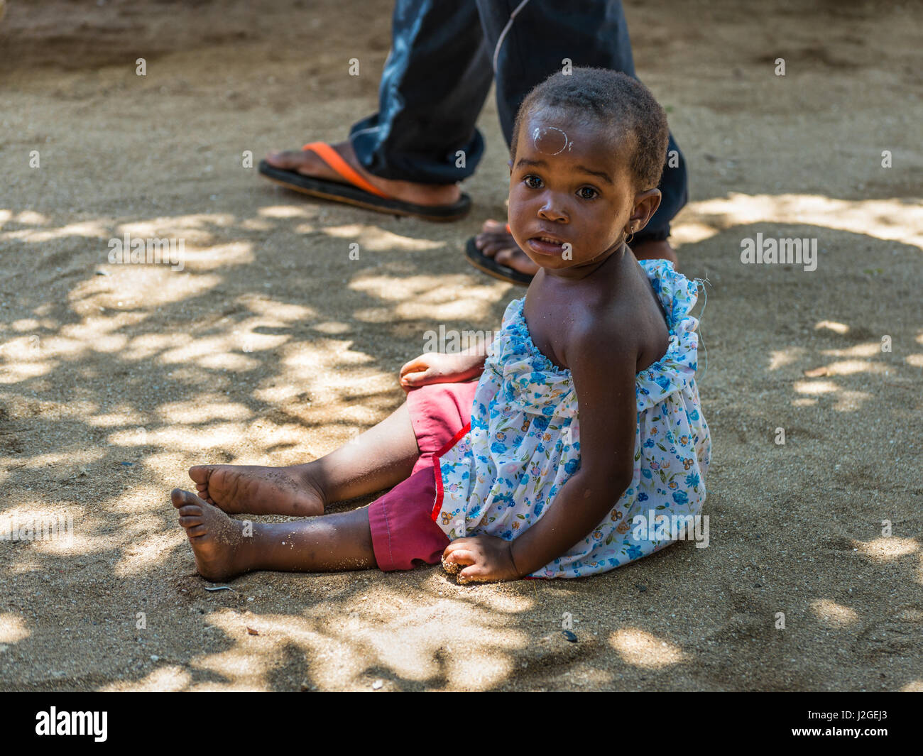 Ampasipohy, Nosy Be, Madagascar - December 19, 2015: Portrait of an unidentified Madagascar child. People in Madagascar suffer of poverty due to slow  Stock Photo