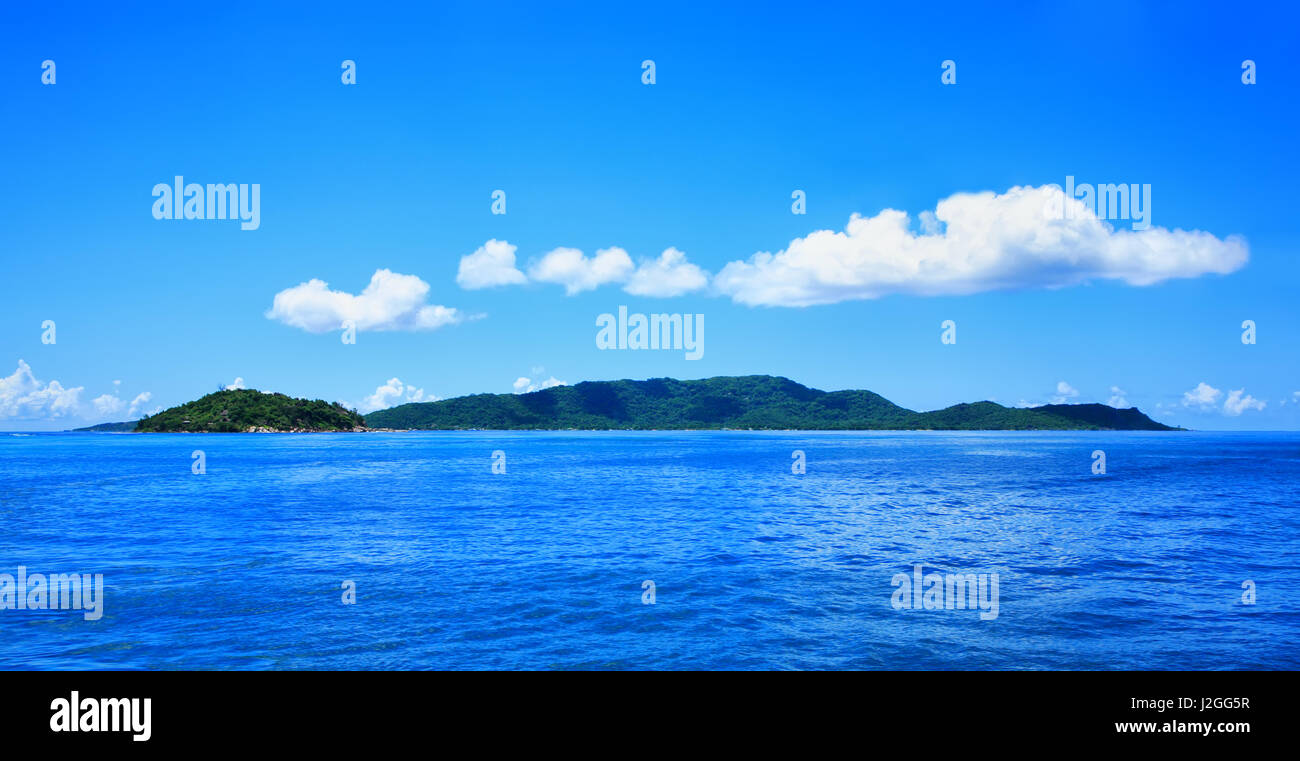 Island La Digue seen from sea, Island Ile Ronde in the foreground, Republic of Seychelles. Stock Photo