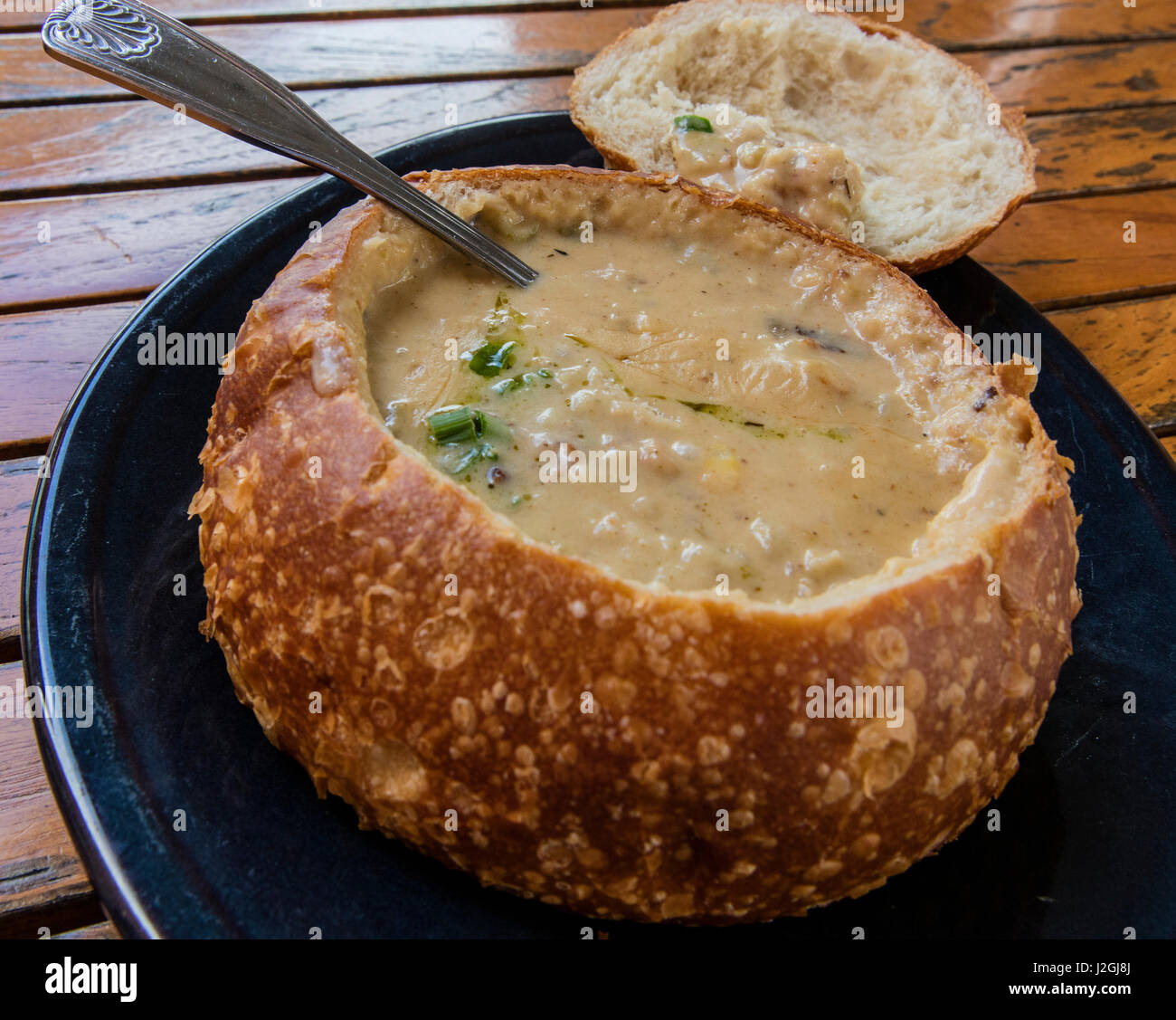 Crab chowder in sourdough bread bowl in Fisherman's Wharf in San Francisco, California, USA