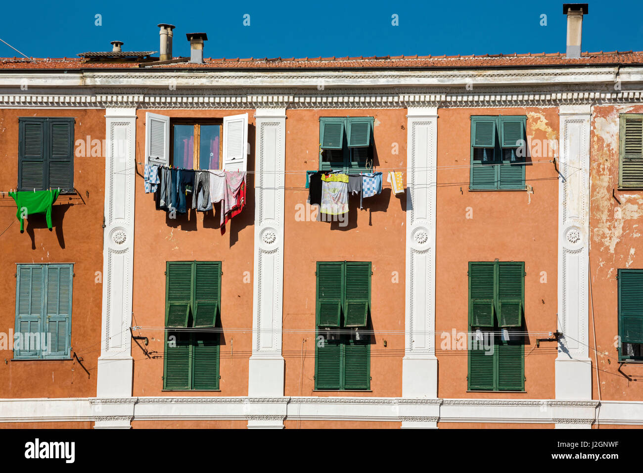 Traditional colored facades on the sea front at san remo Stock Photo