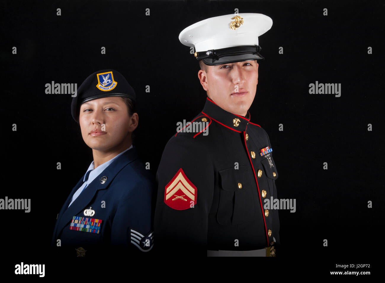 Sister and brother Brittinie Alvarez (Air force) and Blake Alvarez (Marine), dressed in uniforms during the Shoshone-Bannock Festival, Fort Hall Idaho. Stock Photo