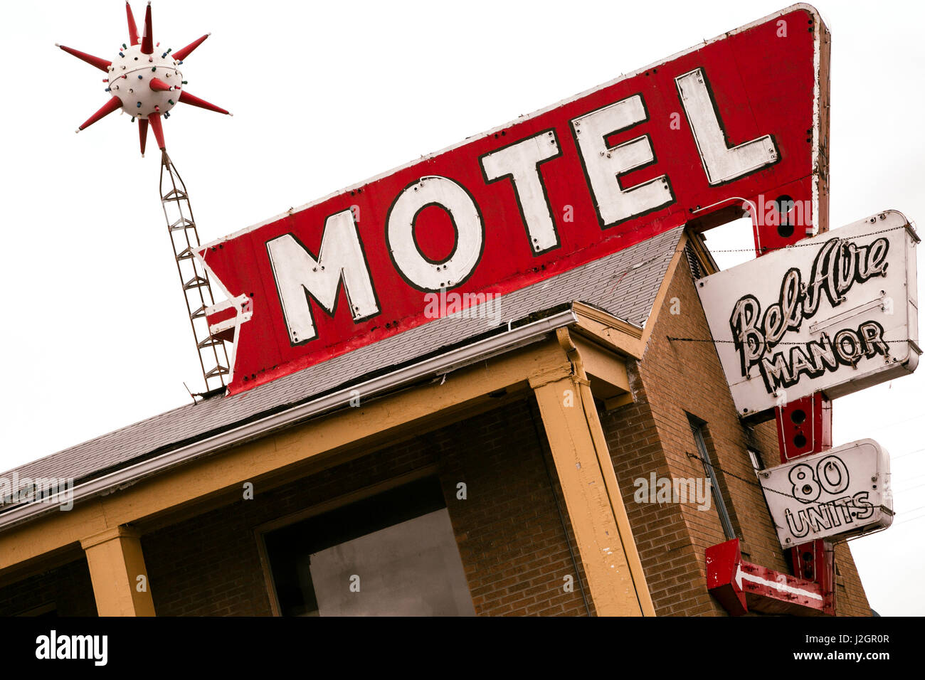 Angled view of a rooftop neon motel sign, Springfield, Illinois, USA