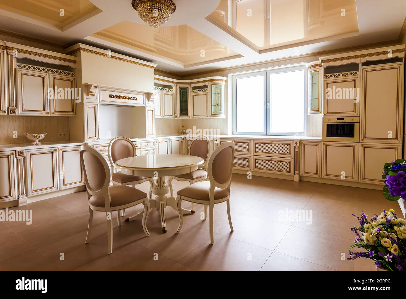 Luxury modern fitted kitchen interior. Kitchen in luxury home with ...