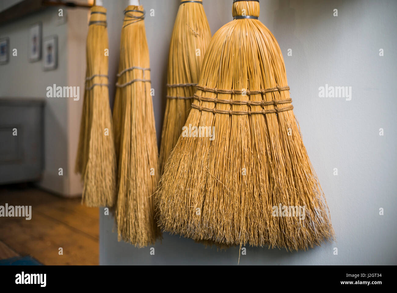 USA, New Hampshire, Enfield Shaker Museum, Shaker brooms Stock Photo