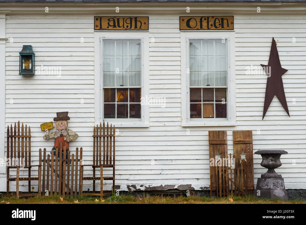 USA, New Hampshire, Lake Winnipesaukee, Moultonborough, antique shop with signs, laugh-often Stock Photo