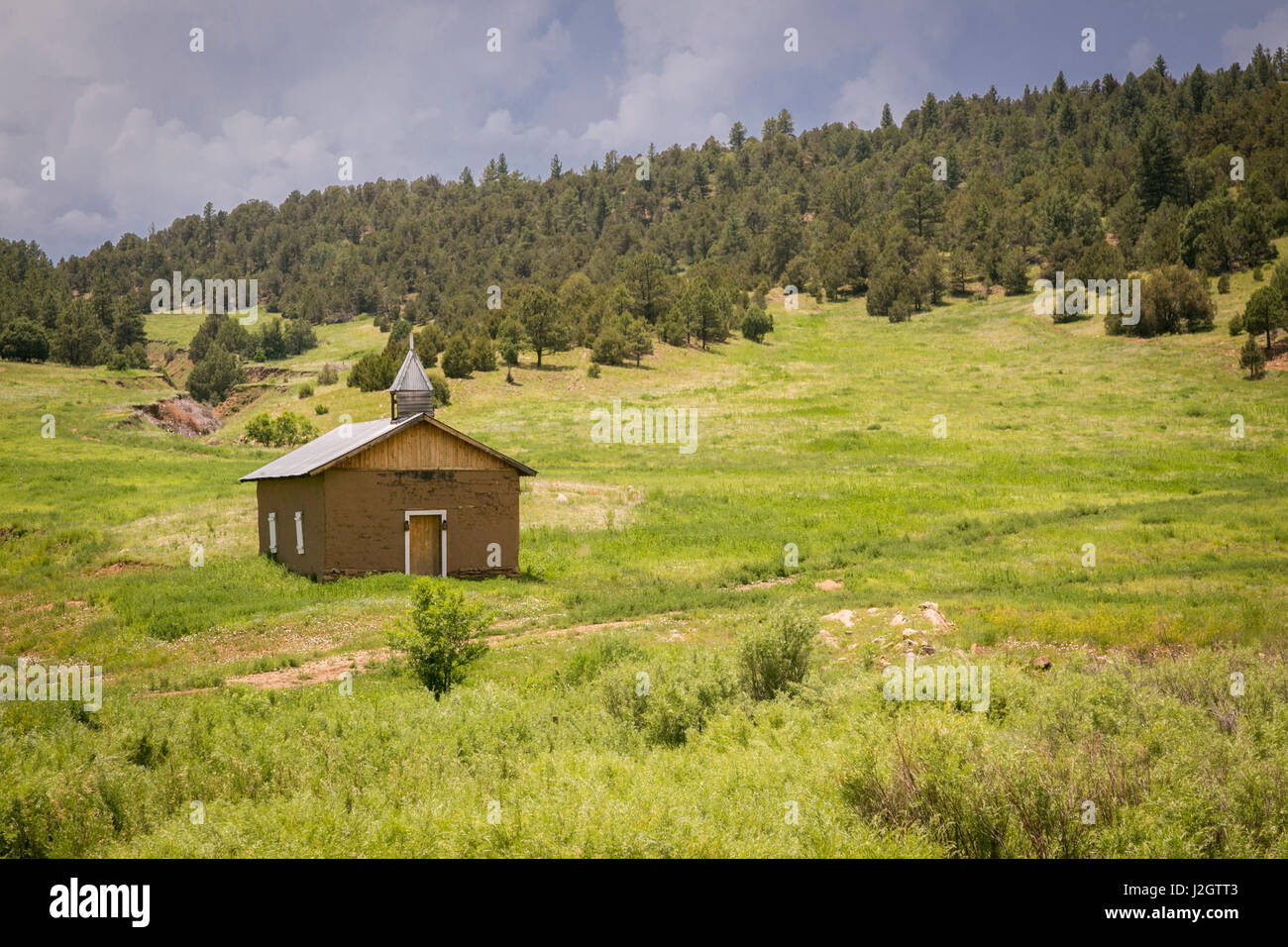 Rustic small building out in a field, Mora, New Mexico, USA Stock Photo