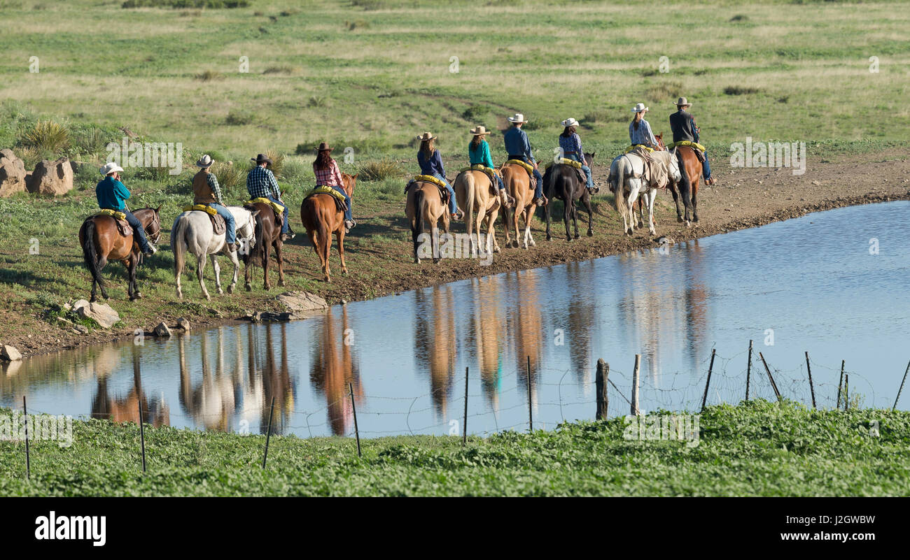 Philmont Cavalcade ride along pond with reflection, Cimarron, New