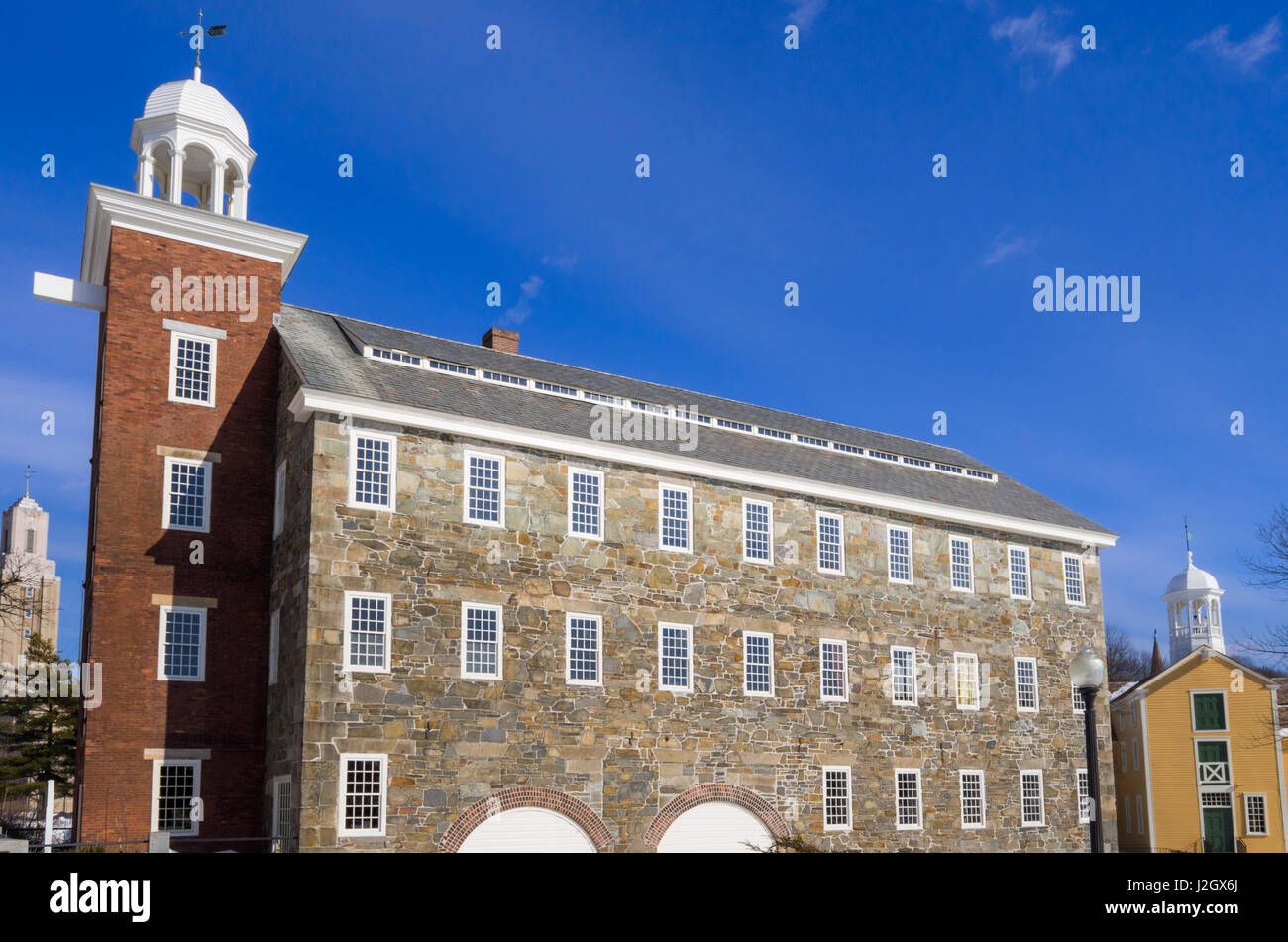 USA, Rhode Island, Pawtucket, Slater Mill, early mill complex, winter Stock Photo