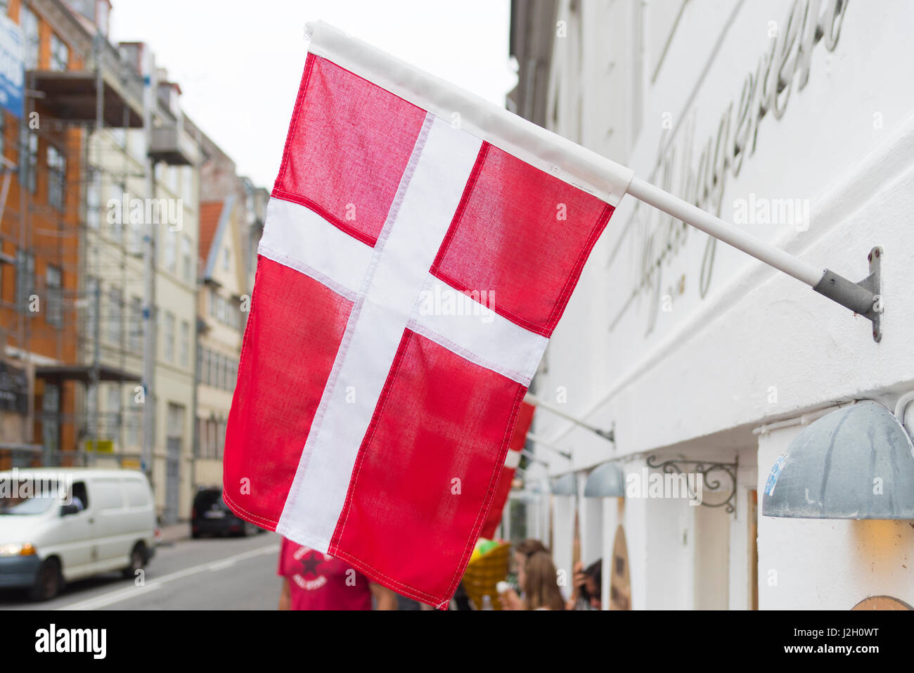 danish flag in the streets of copenhagen, the danish capital Stock Photo