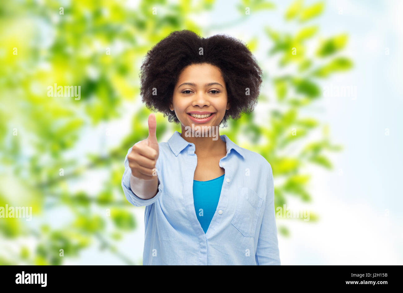 happy afro american woman showing thumbs up Stock Photo - Alamy