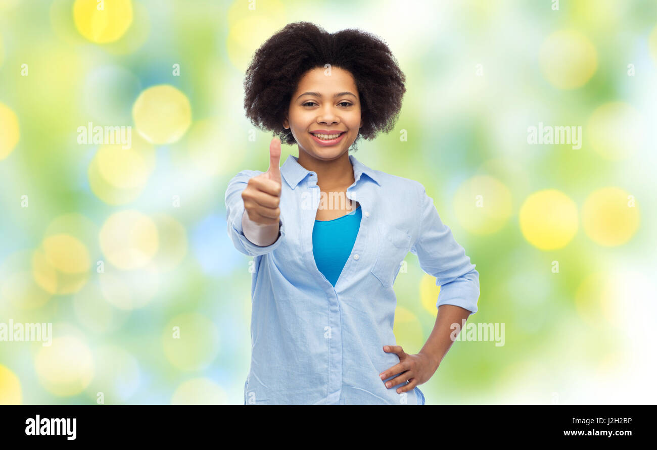 happy african american woman showing thumbs up Stock Photo - Alamy