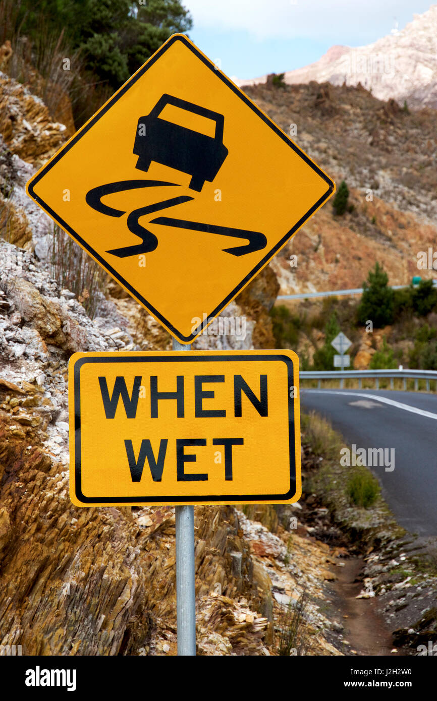 Warning Sign Slippery Road In High Resolution Stock Photography and Images Alamy