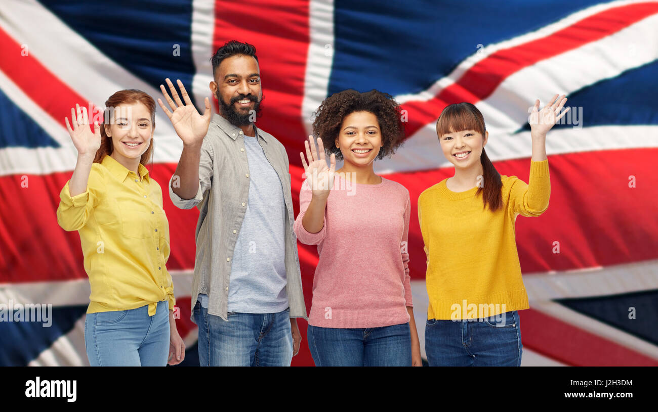 international group of happy people waving hands Stock Photo - Alamy