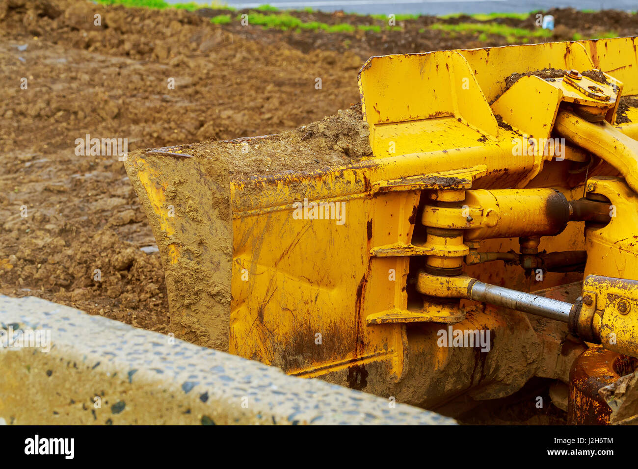 The tractor or Bulldozer on construction site tractor, work, yellow Stock Photo