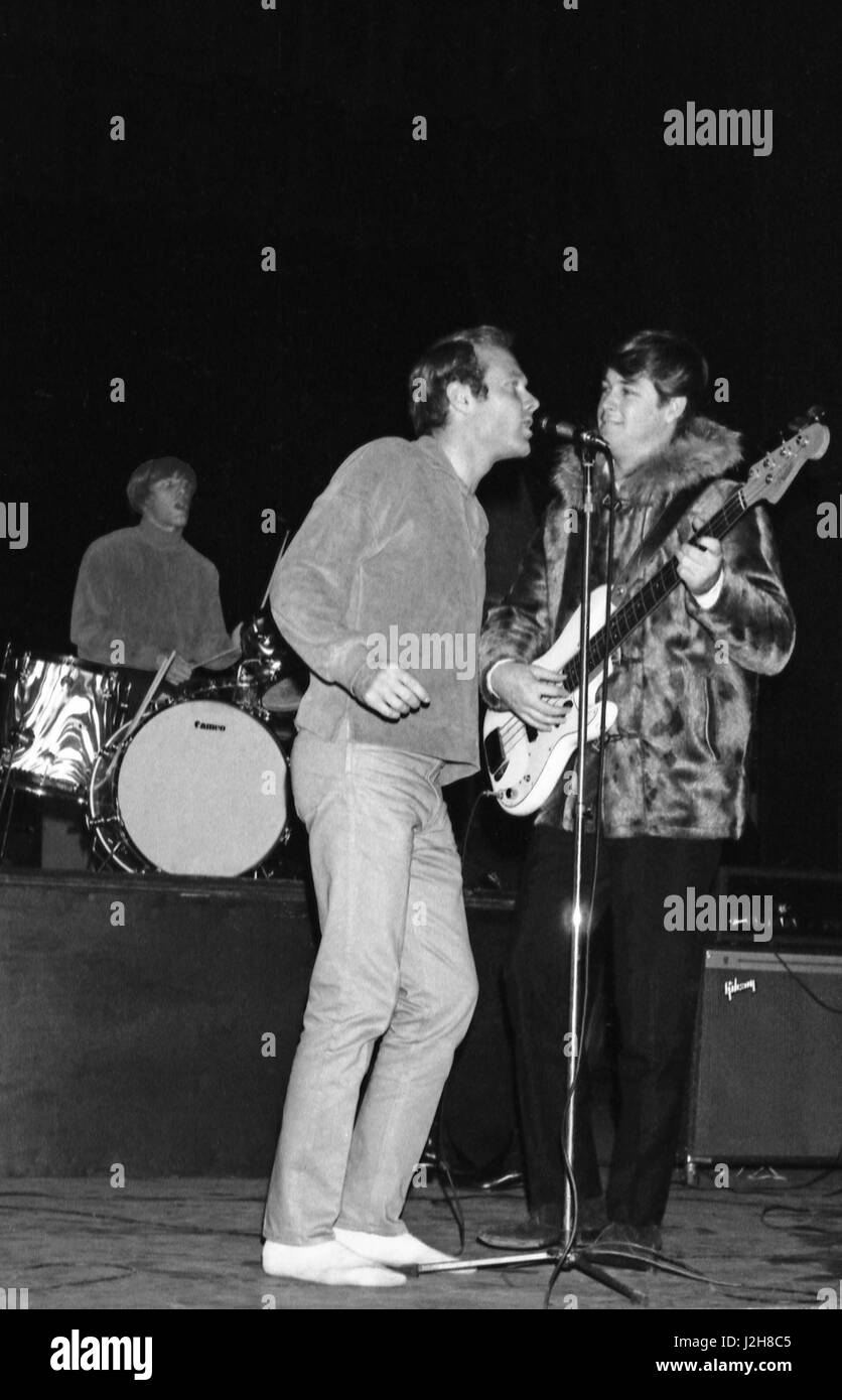 American band The Beach Boys on the stage of the Olympia Hall in Paris.  1964  From left to right: Dennis Wilson (drums), Mike Love, Carl Wilson Photo André Crudo Stock Photo